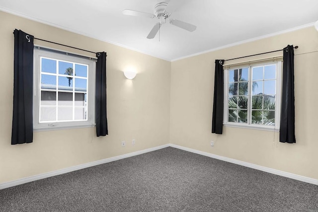 unfurnished room featuring ceiling fan, crown molding, and carpet floors