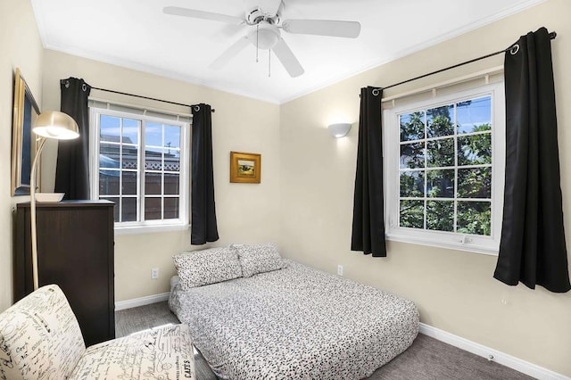 bedroom featuring ceiling fan and carpet floors