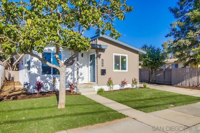 view of front of home with a front yard