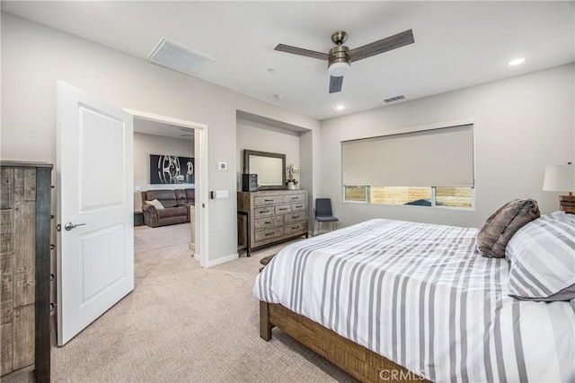 carpeted bedroom with ceiling fan