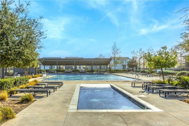 view of pool with a patio area