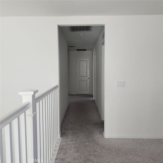 hallway with carpet