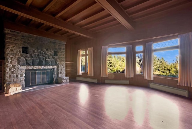 unfurnished living room featuring wooden ceiling, hardwood / wood-style floors, a baseboard heating unit, and a stone fireplace