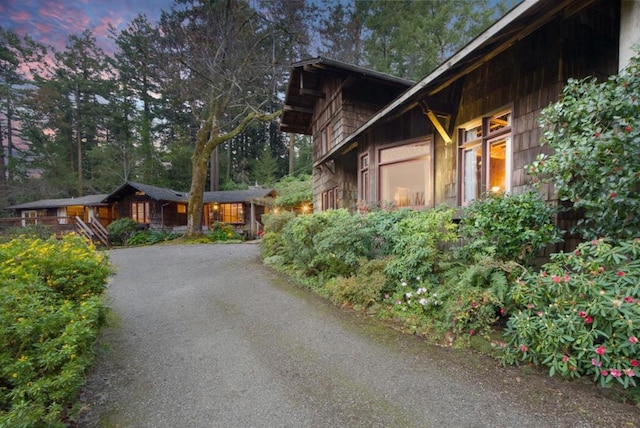 view of property exterior at dusk