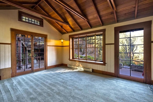 interior space with lofted ceiling with beams, baseboard heating, wood ceiling, and wood walls