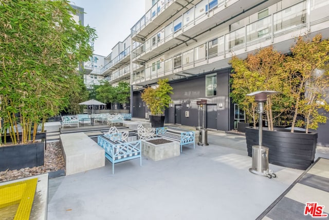 view of home's community featuring a patio area