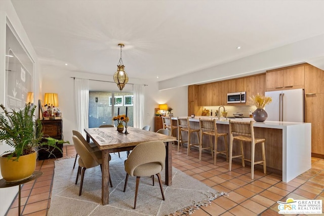 dining space with light tile patterned floors