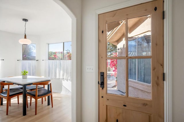 doorway featuring light wood-type flooring