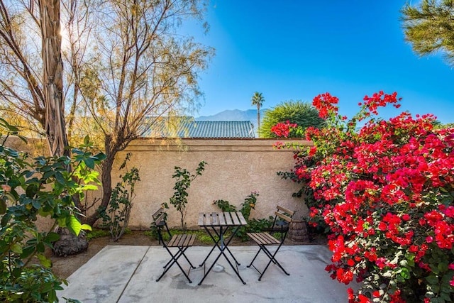 view of patio featuring a mountain view