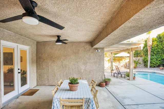 view of patio with french doors, a pergola, a fenced in pool, and ceiling fan