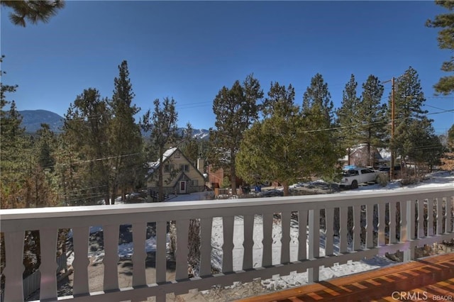 view of snow covered deck