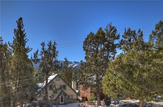 exterior space featuring a mountain view