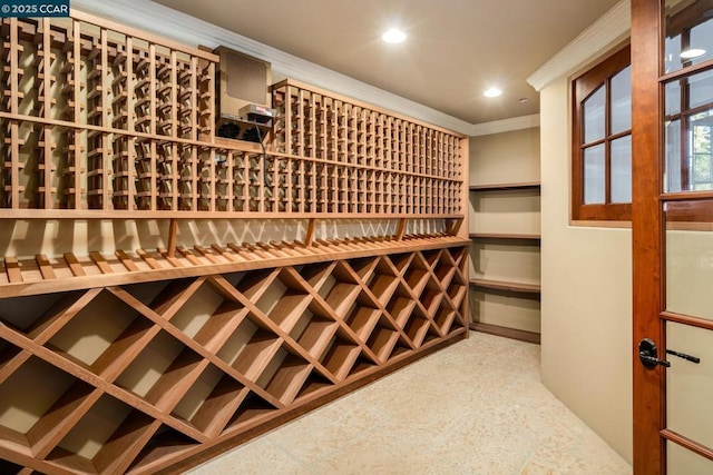 wine room with crown molding