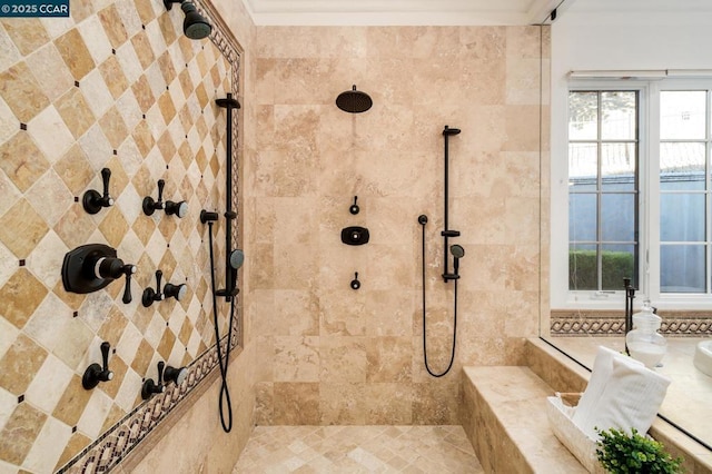 bathroom with a tile shower