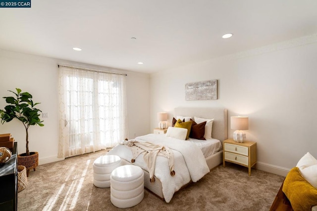 carpeted bedroom with crown molding