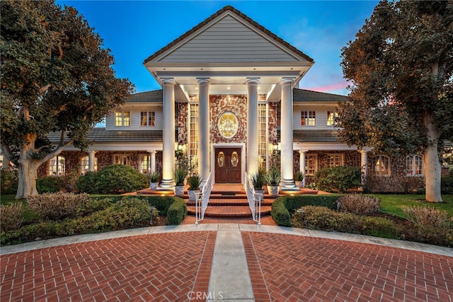 view of greek revival inspired property