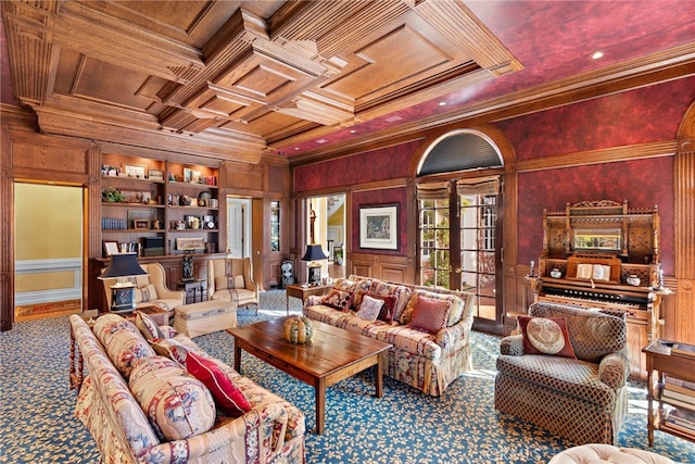 sitting room with carpet flooring, built in features, ornamental molding, and coffered ceiling