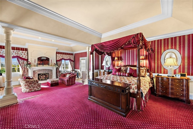 carpeted bedroom featuring crown molding and ornate columns