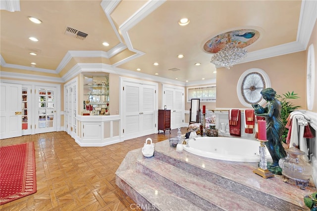 bathroom with parquet flooring, a tub, and crown molding