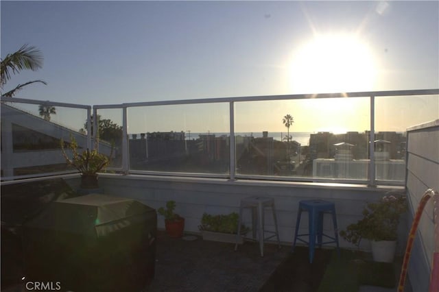 view of pool at dusk