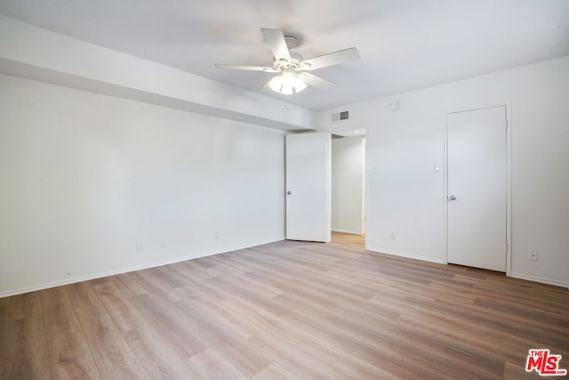 unfurnished room featuring ceiling fan and light hardwood / wood-style flooring