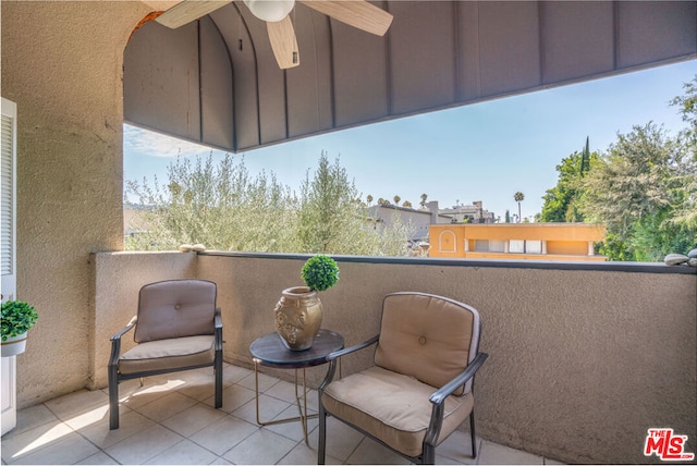 balcony featuring ceiling fan