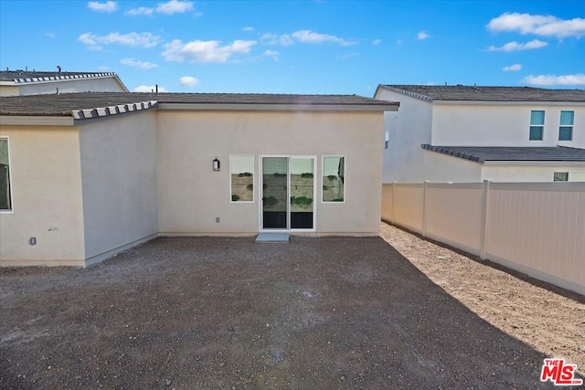 back of house featuring a patio