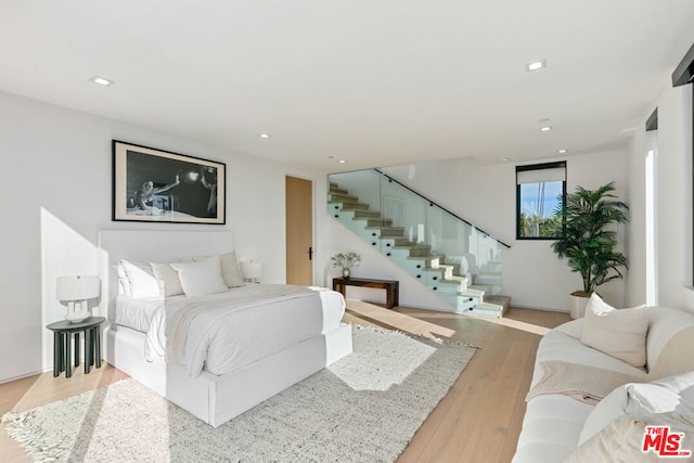 bedroom featuring light hardwood / wood-style flooring