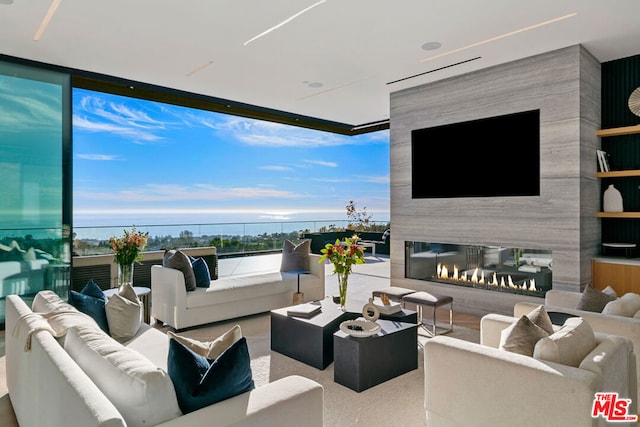 living room featuring a fireplace