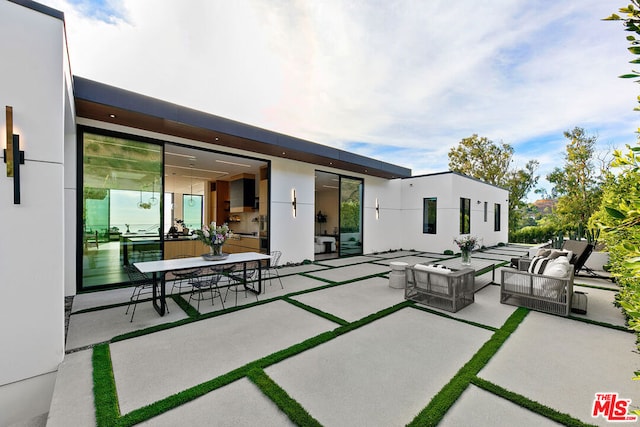 view of patio / terrace featuring an outdoor hangout area