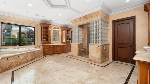 bathroom with tiled tub, vanity, and ornamental molding