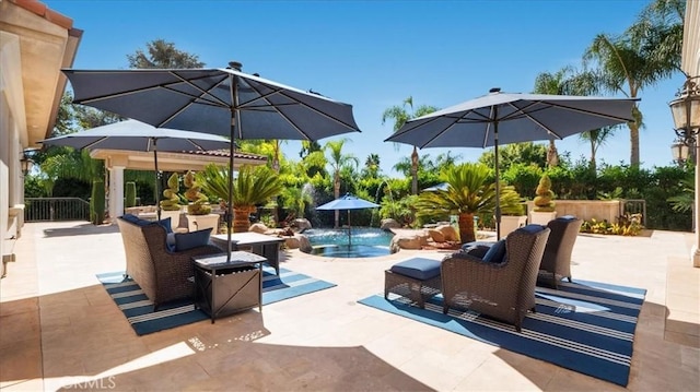 view of patio with pool water feature