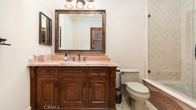 full bathroom featuring vanity, crown molding, washtub / shower combination, and toilet