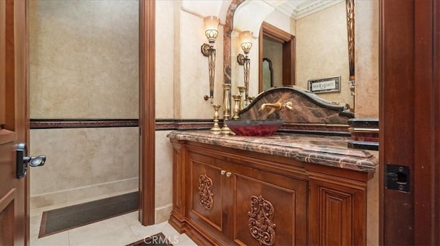 bathroom with vanity and tile patterned floors