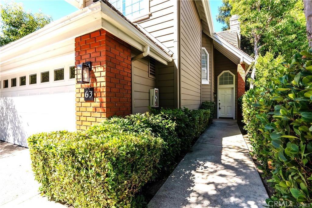 view of side of home with a garage