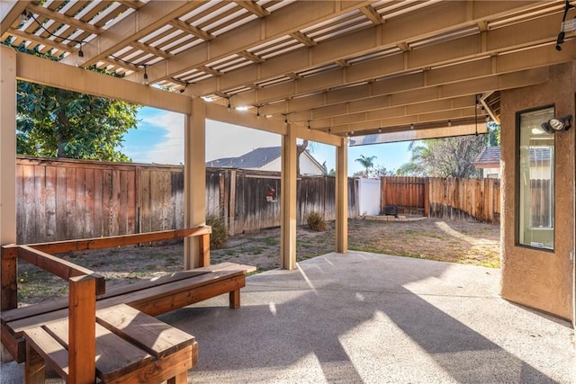 view of patio with a pergola and a mountain view