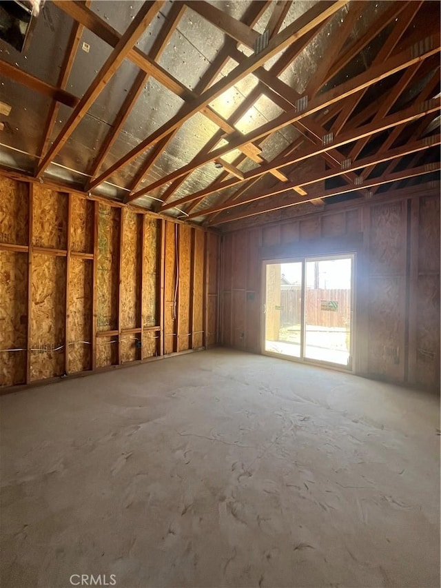 misc room with lofted ceiling