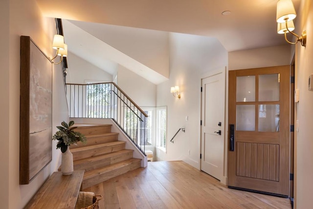 foyer entrance with light hardwood / wood-style flooring