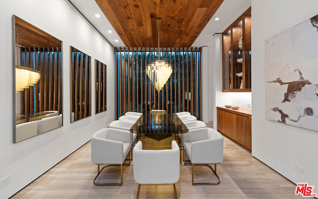 sitting room with wooden ceiling and light wood-type flooring