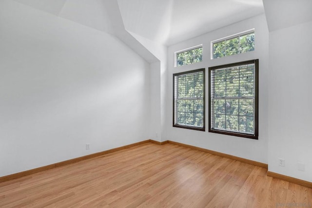 spare room featuring light hardwood / wood-style floors