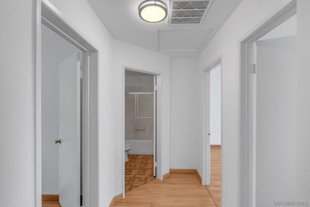 hall featuring light parquet flooring