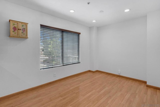 empty room featuring light hardwood / wood-style floors