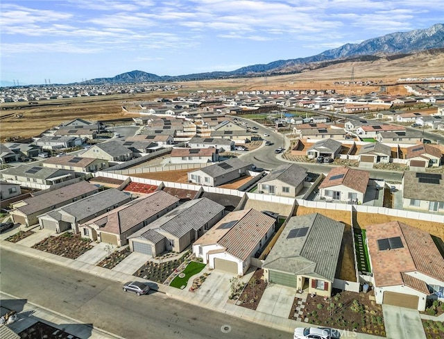 drone / aerial view featuring a mountain view