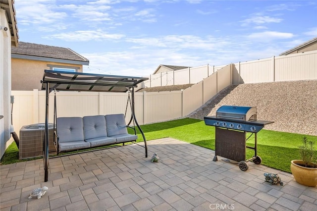 5097 Larkspur Rd, Banning, CA 92220 - fenced backyard featuring a patio area, cooling unit, and grilling area