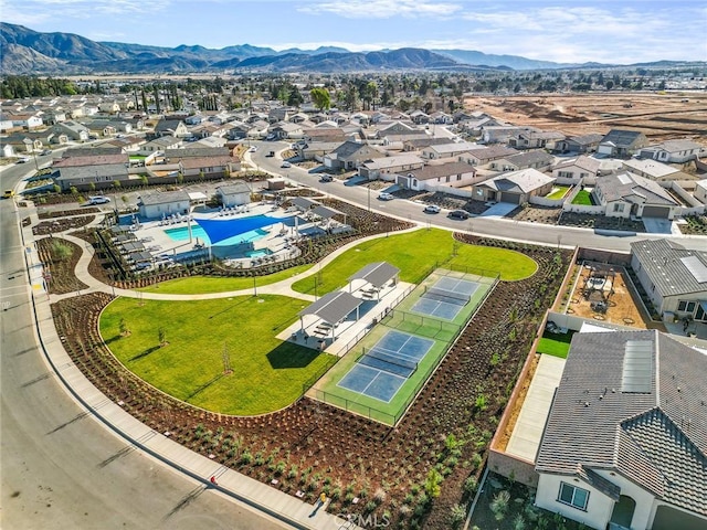 birds eye view of property featuring a mountain view