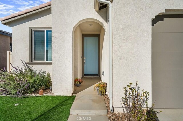 5097 Larkspur Rd, Banning, CA 92220 - entrance to property featuring stucco siding