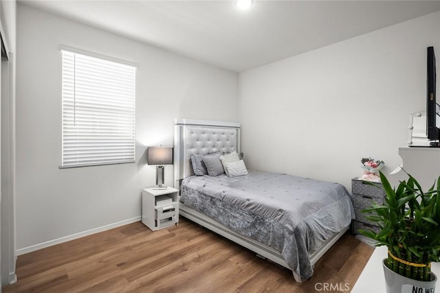 bedroom featuring hardwood / wood-style floors