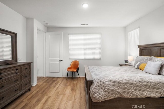 5097 Larkspur Rd, Banning, CA 92220 - bedroom featuring light wood finished floors and baseboards