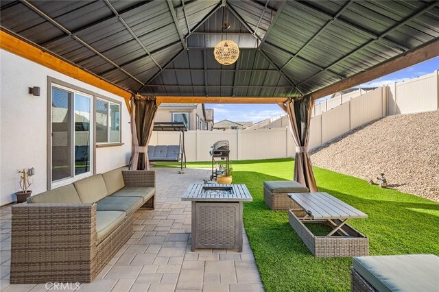 5097 Larkspur Rd, Banning, CA 92220 - fenced backyard with a gazebo, an outdoor living space with a fire pit, and a patio area