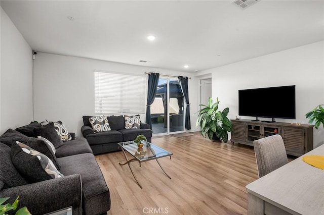 5097 Larkspur Rd, Banning, CA 92220 - living area with light wood-type flooring and recessed lighting